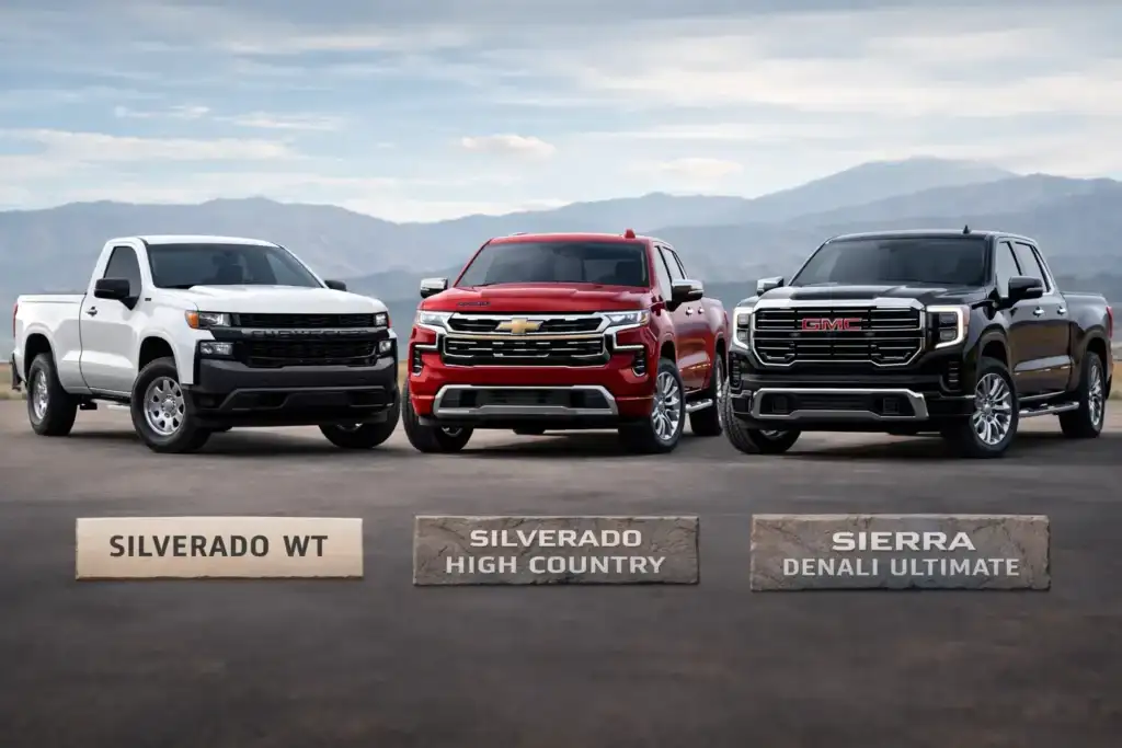 Trucks in front of mountain range