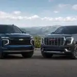 SUVs in scenic mountain setting