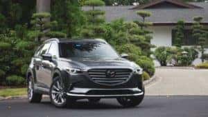 2022 Mazda CX-9 parked in front of a suburban house