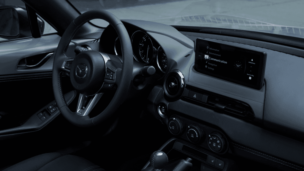 https://di-uploads-pod17.dealerinspire.com/superiormazdaofbentonville/uploads/2025/02/2025-mazda-mx-5-miata-rf-interior-1024x576.png