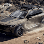 2026 Mazda CX-50 driving in the dirt