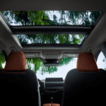 Mazda model with open moonroof