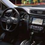 Steering wheel and front seats of 2020 Nissan Rogue interior
