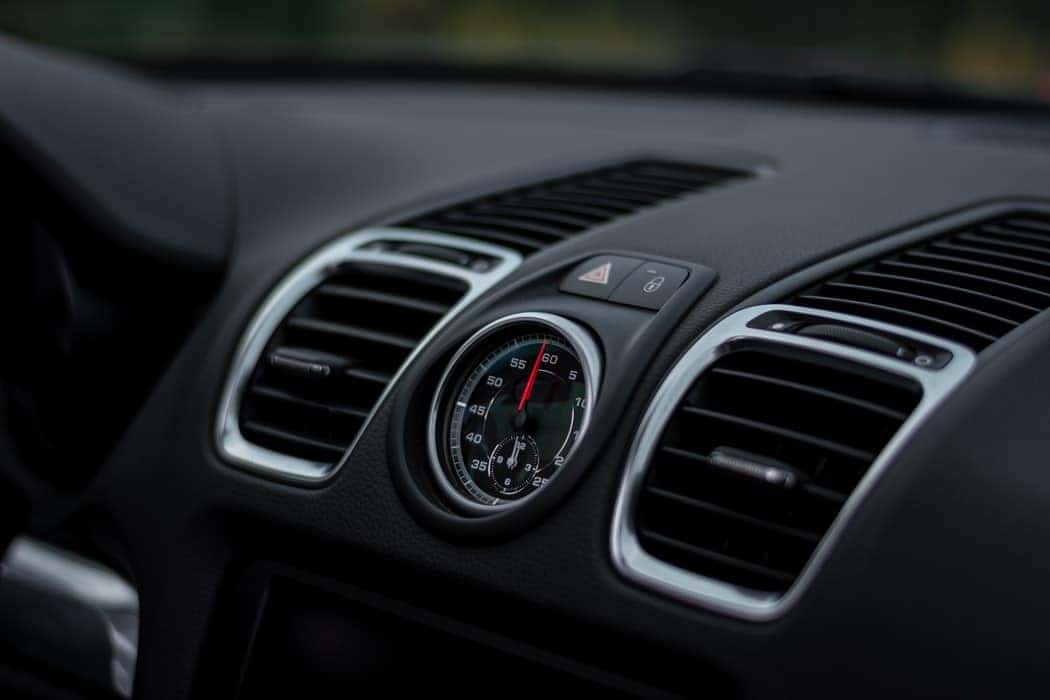 the interior of a nice car, specifically its air conditioning vents.