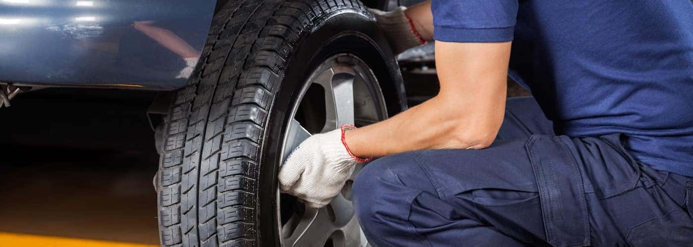 Changing tire in a service shop