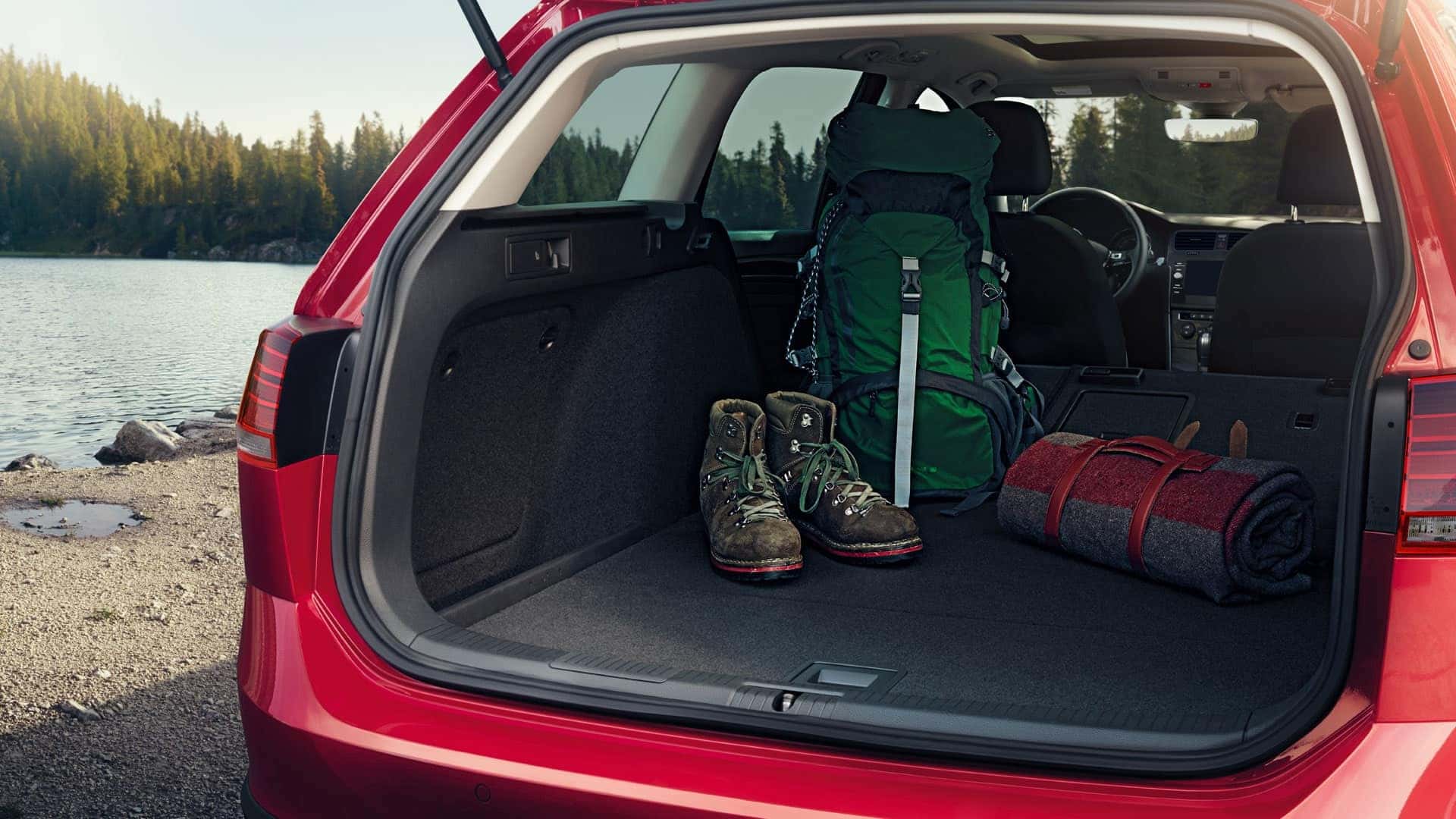 Camping gear in a red 2019 VW Golf Alltrack