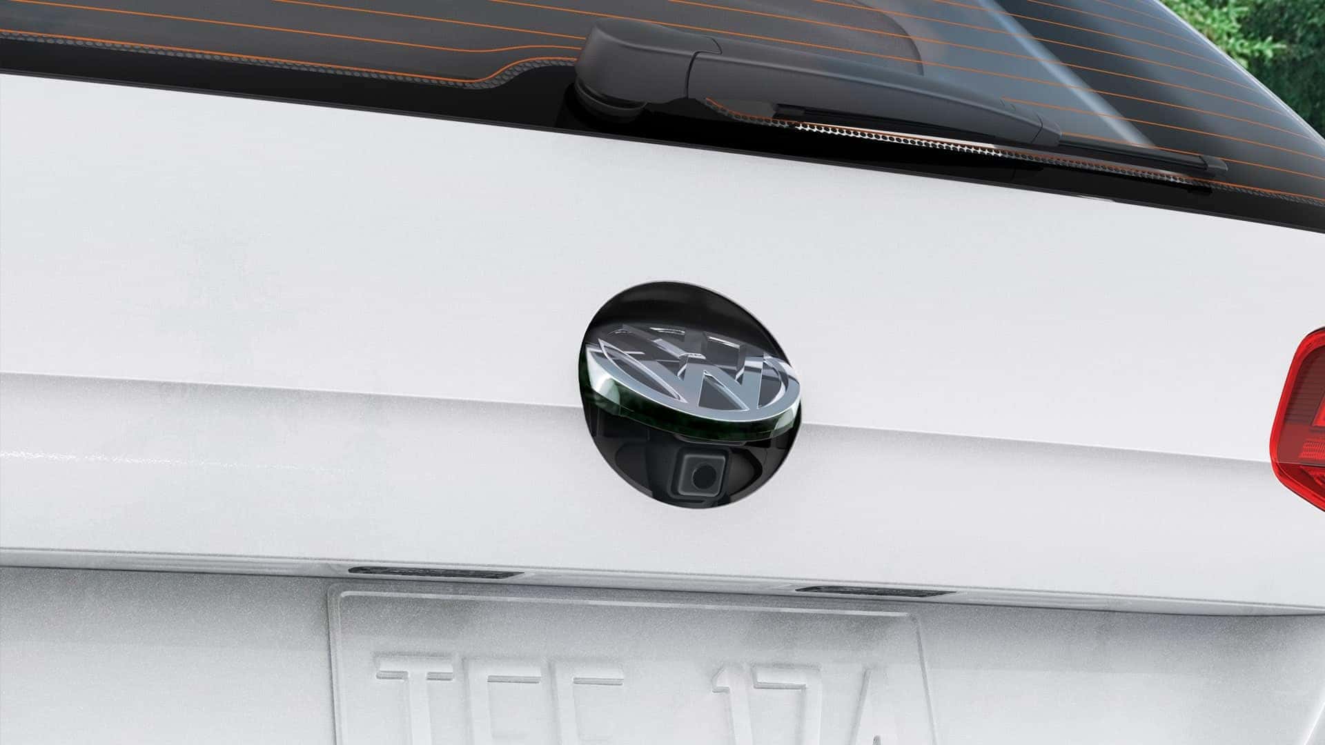 2019 VW Golf Alltrack Rearview camera peeking out from beneath the VW logo