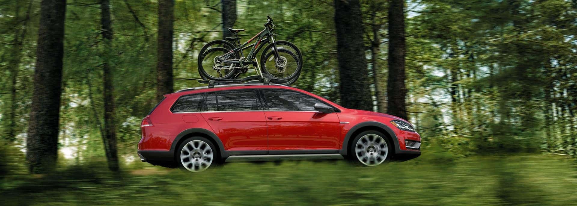 2019 VW Golf Alltrack driving through the forest