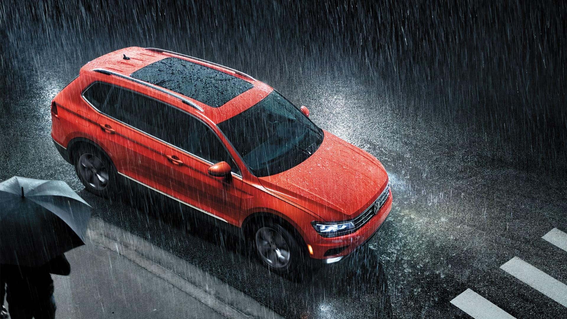 Red Tiguan in the rain