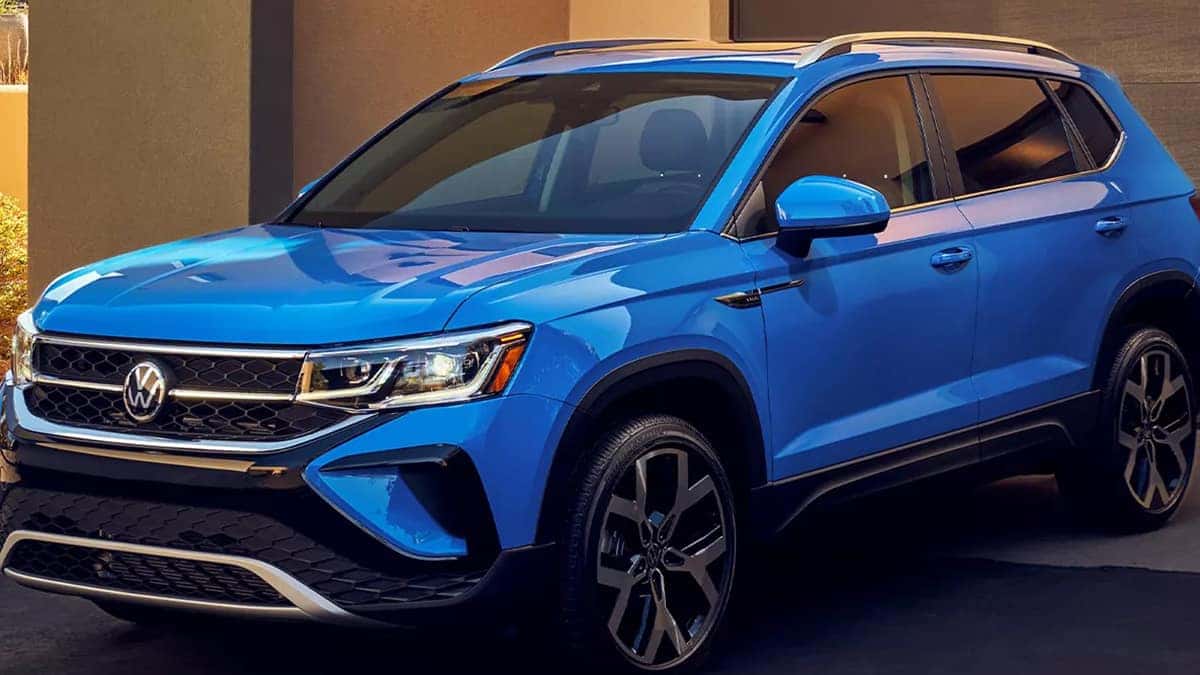Blue Taos parked on driveway